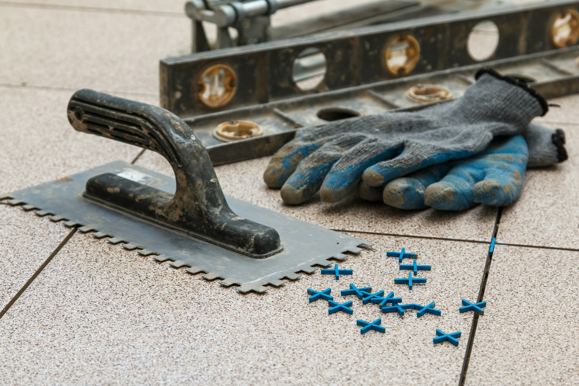 Installation of floor tiles